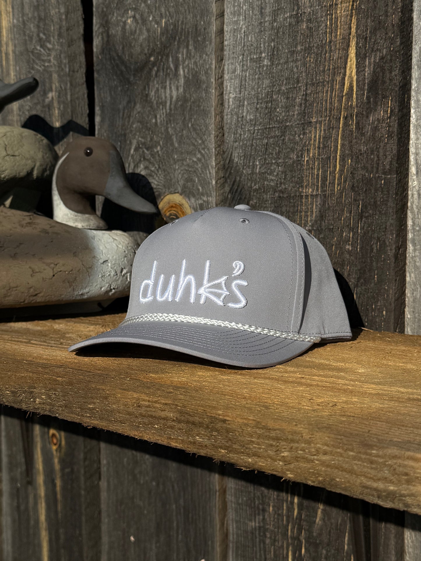 Light Gray embroidered duhk's logo hat. Snap back Richardson 258