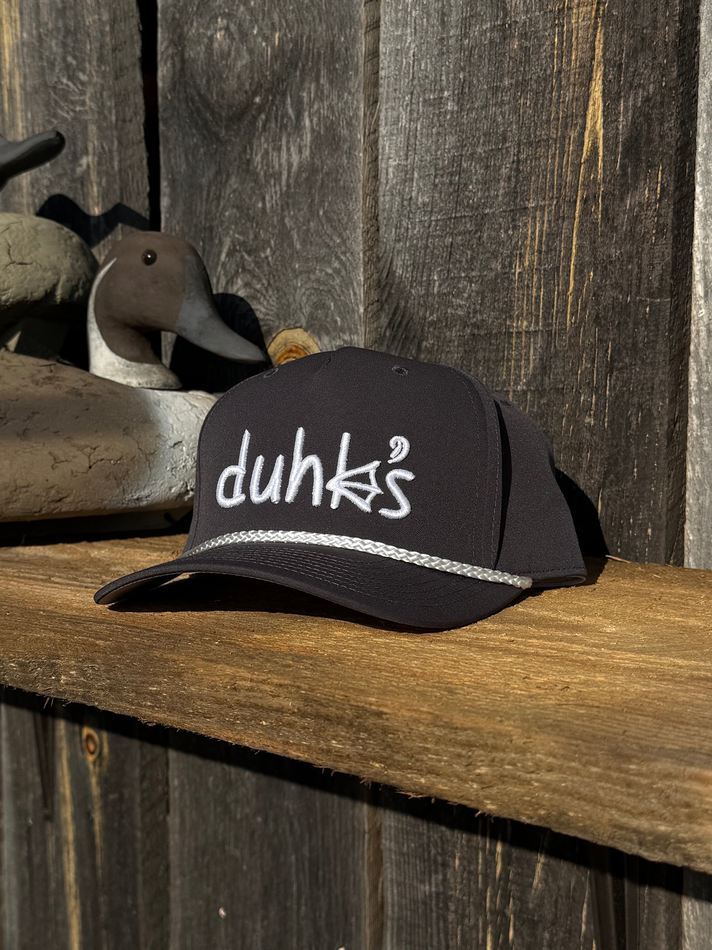 Dark Gray embroidered duhk's logo hat. Snap back Richardson 258